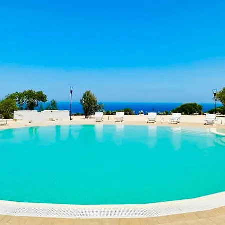 Apartahotel With Swimming-pool In Isola Rossa, Just About 2 Km From The La Marinedda 4*